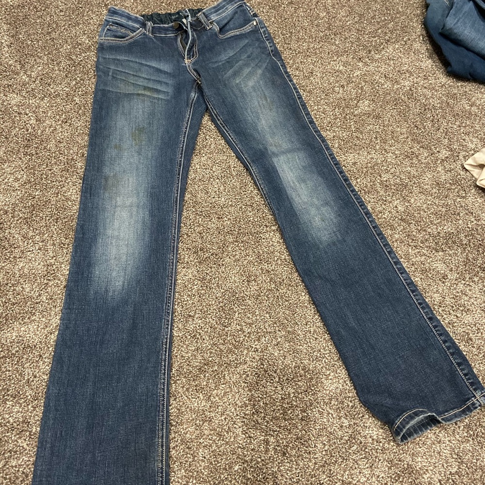Q-baby riding wranglers women’s jeans
